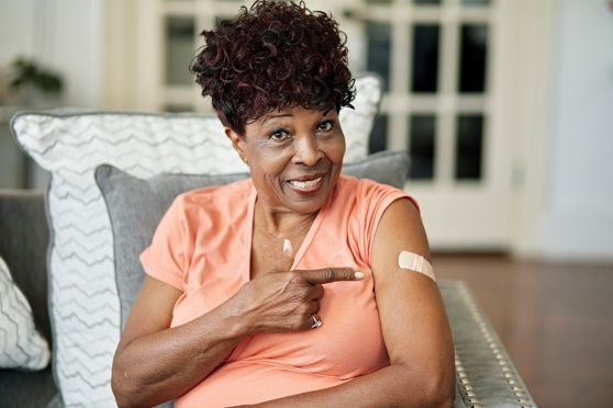 Woman keeping lungs healthy by getting an essential vaccine